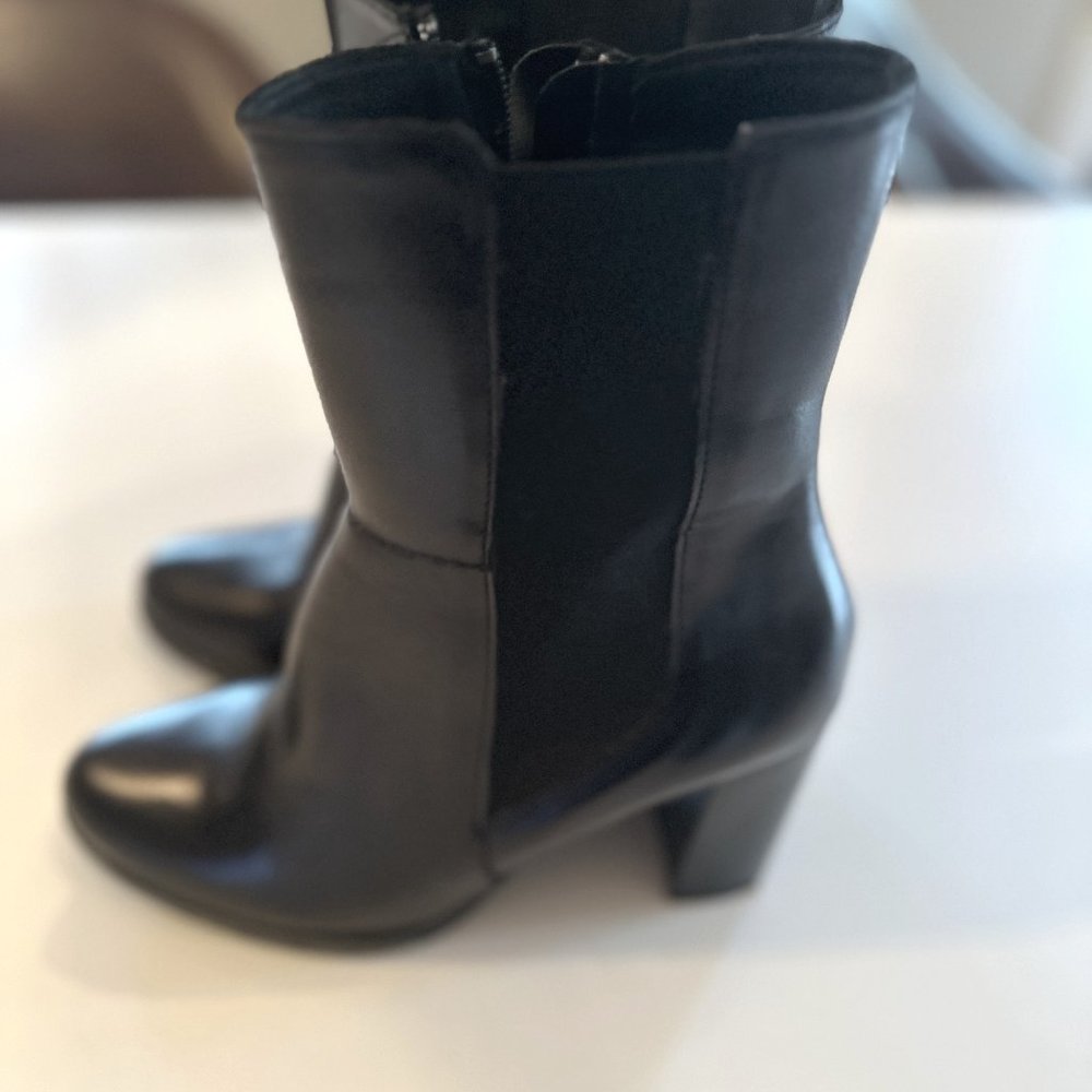 Black, 3 1/2" heel boot, like-new condition, leather upper/man-made sole, size 8